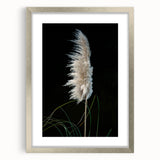 Floral and botanical frame showcasing intricate designs in silver, set against a light mat background, perfect for enhancing home decor or art displays.