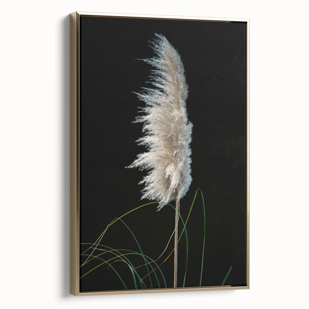 Framed canvas artwork showcasing a vibrant floral and botanical design in gold tones, elegantly displayed from the side to highlight its depth and craftsmanship.