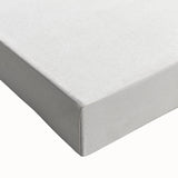 Close-up of a large art piece featuring black and white landscape art paintings of fruits on stretched canvas.