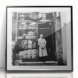 Large abstract wall art featuring silhouettes of people and food items in black and white, framed in acrylic.