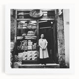 Large black and white stretched canvas featuring a bustling market scene, ideal for kitchen wall art.