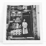 Black and white large art on stretched canvas depicting a bustling food market scene, ideal for kitchen wall art.