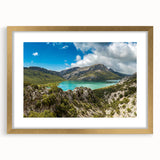 Textured abstract art print of an Ethiopian landscape in muted earth tones on a gold-framed canvas.