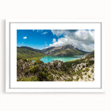 Extra large abstract art print of Ethiopian scenery in muted earth tones on a textured canvas, framed with a white mat.