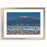 Abstract art print of Kenyan scenery in silver frame with mat, featuring earthy tones, ideal for dining room decor.