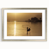 Abstract art print of an African scenery in silver frame, using muted earth tones, ideal for dining room decor.