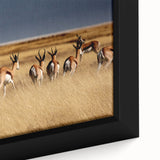 Extra large framed canvas of a textured African scenery in black with colorful accents, ideal for living room decor.