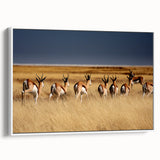 Vintage poster art of an African scenery on a framed canvas with vibrant colors, ideal for living room decor.