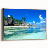 Framed canvas featuring a serene Seychelles landscape with lush greenery and calm blue waters, ideal for bedroom wall art.