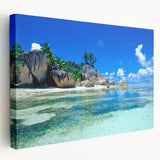 Large stretched canvas featuring a serene Seychelles scenery in muted blue and green tones, ideal for kitchen wall art.