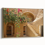 Framed canvas featuring a vintage-style landscape painting of a Tunisian scenery in gold and black tones.