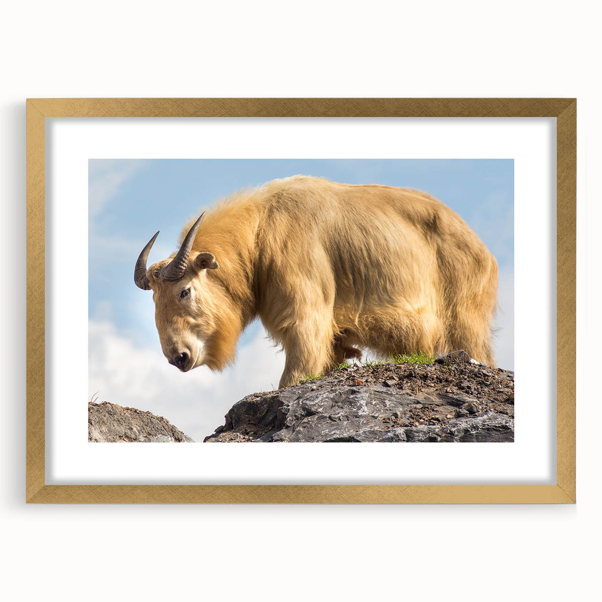 Extra large abstract art print of a Bhutanese landscape in textured gold frame, ideal for living room decor.