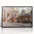 Large abstract wall art depicting a Cambodian landscape in muted earth tones, framed in black acrylic.