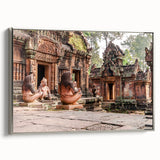 Framed canvas featuring a vintage-style landscape painting of a Cambodian scenery in muted colors.