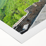 Art deco poster of the Great Wall of China in muted earth tones on rolled canvas, suitable for dining room decor.