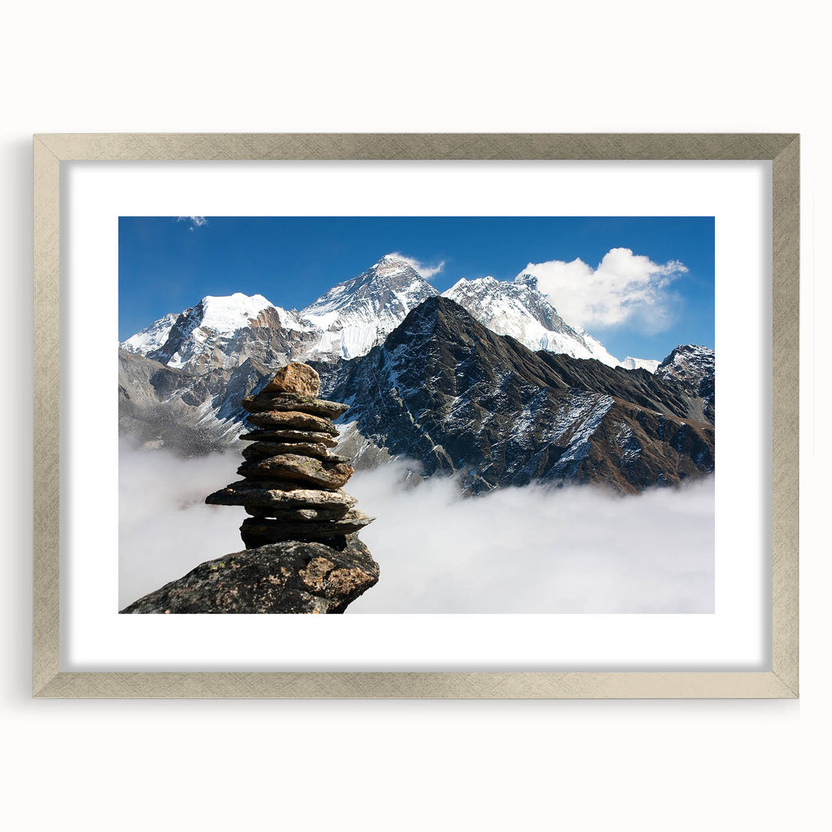 Textured art depicting abstract Tibetan scenery in muted earth tones on a framed silver mat, suitable for bedroom decor.