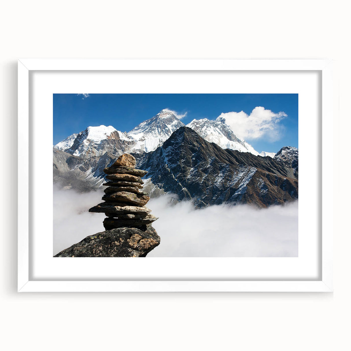 Abstract art print of Tibetan landscape in muted blues and greens on a framed white canvas, ideal for dining room decor.