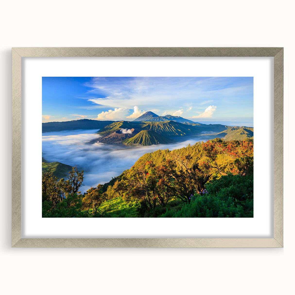 Textured abstract art print of Indonesian scenery in muted earth tones, framed with a silver mat, suitable for bedroom decor.