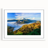Abstract art print depicting a serene Indonesian landscape in soft blue and green tones, framed with a white mat.