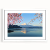Abstract art print depicting Mount Fuji with muted blue and white tones on a framed canvas.