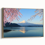 Framed canvas featuring a vintage-style landscape painting of Mount Fuji with a predominantly black and gold color scheme.