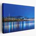 Side view of a stretched canvas featuring a serene Seoul cityscape in muted gray and blue tones, ideal for kitchen wall art.