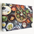 Side view of a stretched canvas depicting a serene Korean landscape in muted green and blue tones.