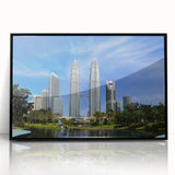 Large abstract wall art depicting a Malaysian landscape in muted earth tones on a framed acrylic.