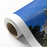 Art Deco poster of a Malaysian landscape on rolled canvas, featuring muted green and blue tones, ideal for nursery wall art.