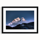Abstract art print of Mount Everest in vibrant colors on a textured, extra large canvas, framed in black.