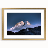 Extra large abstract art print of Mount Everest in textured hues of blue and gray, framed in gold.