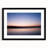 Colorful abstract art print of a textured Asian landscape in vibrant hues, framed with a black mat.