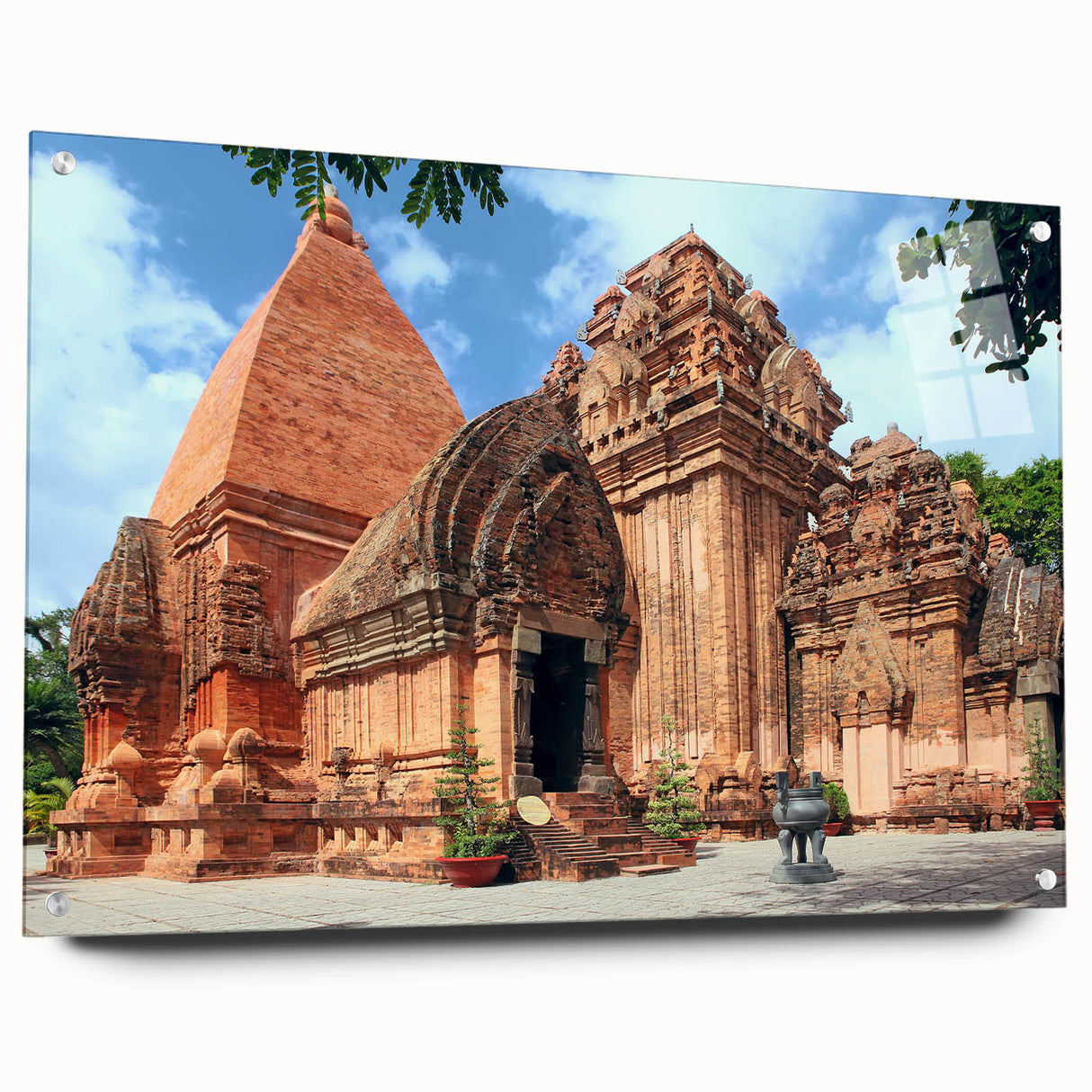 Acrylic print of a Vietnamese landscape, featuring lush greenery and a river, in vibrant green and blue tones.