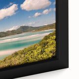 Close-up of a textured black wall art depicting the Great Barrier Reef on a framed canvas, with vibrant marine colors.