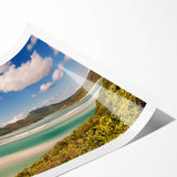 Extra large wall art of the Great Barrier Reef in vibrant blue and green tones, printed on rolled canvas.