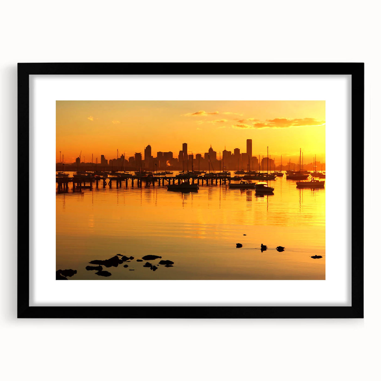 Extra large abstract art print of Melbourne skyline in muted gray and blue tones on a framed canvas.