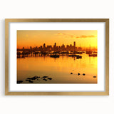 Textured abstract art print of Melbourne skyline in muted gold and blue tones on a framed canvas, ideal for bedroom art.