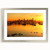 Abstract art print of Melbourne skyline in muted silver and gray tones, framed with a silver mat.