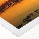 Art deco poster of Melbourne skyline in muted gold and navy on rolled canvas, suitable for dining room wall art.