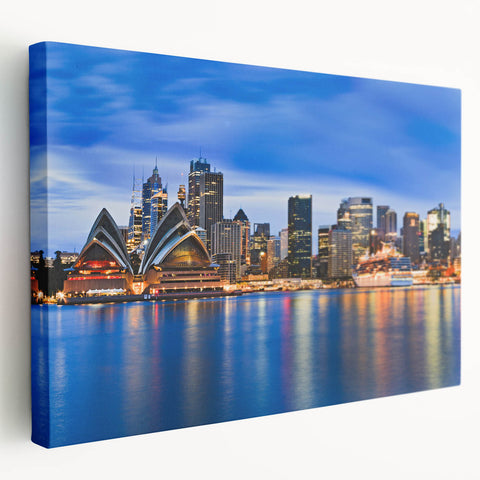A panoramic Sydney skyline image on stretched canvas, featuring vivid blue and white tones, suitable for kitchen wall art.