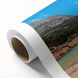 Art deco poster of Tasmania scenery in muted green and blue tones on rolled canvas, ideal for nursery wall art.