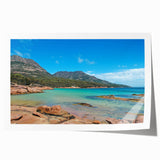 Scenic Tasmania landscape on rolled print, featuring lush greenery and water, ideal for dining room wall art.