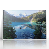 Acrylic print of a serene British Columbia landscape in soft blue and green tones, framed in white.