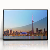 Large abstract wall art depicting a serene Ontario landscape in cool blue and green tones on a framed acrylic print.