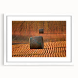 Abstract art print of Saskatchewan scenery in muted earth tones, framed with a white mat, suitable for dining room decor.