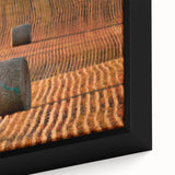 Close-up of a textured black wall art depicting colorful Saskatchewan scenery on a framed canvas.