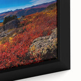 Extra large framed canvas of a textured Yukon scenery in black with colorful accents, ideal for living room decor.