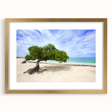 Abstract art print of a Caribbean scene in muted blues and greens, framed in gold, suitable for bedroom or dining room decor.