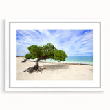 Textured abstract art print of a Caribbean scenery in muted blue and green shades, framed with a white mat.