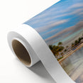 Art deco poster of Caribbean scenery on rolled canvas, featuring serene blue and white tones, ideal for nursery wall art.